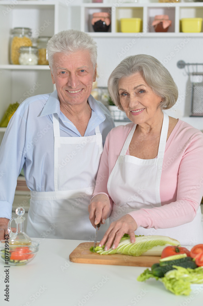senior man and woman  in the kitchen