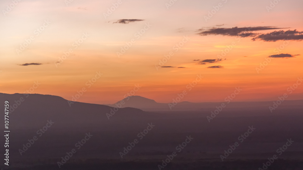 Morning glow against mountains background. Manyara Lake National Park, Tanzania.
