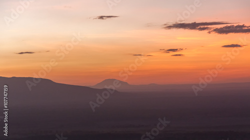 Morning glow against mountains background. Manyara Lake National Park, Tanzania.
