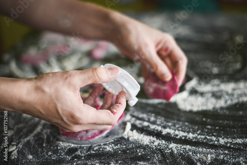 Making of homemade dumplings pastry tortellini or ravioli