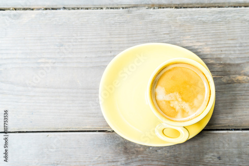 coffee cup on wooden table ,soft focus