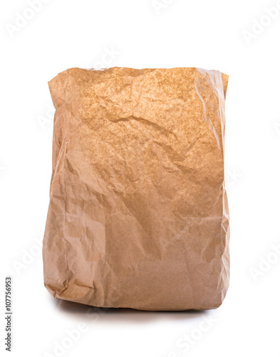 Used brown paper bag on white background