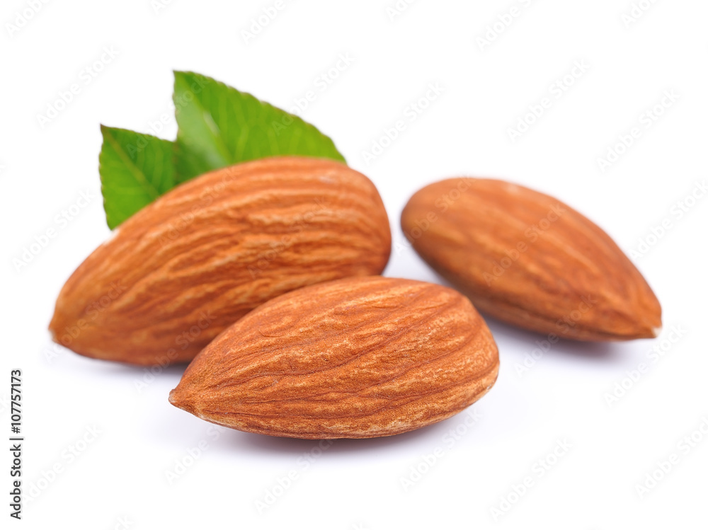 Almonds nuts with leaves close up Almonds nuts with leaves close up