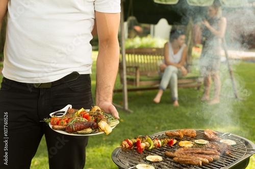 Plate full of grilled food