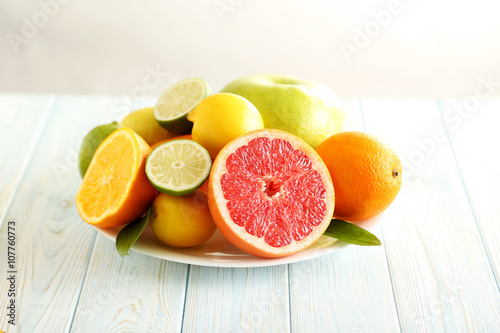 Citrus fruits on a blue wooden table