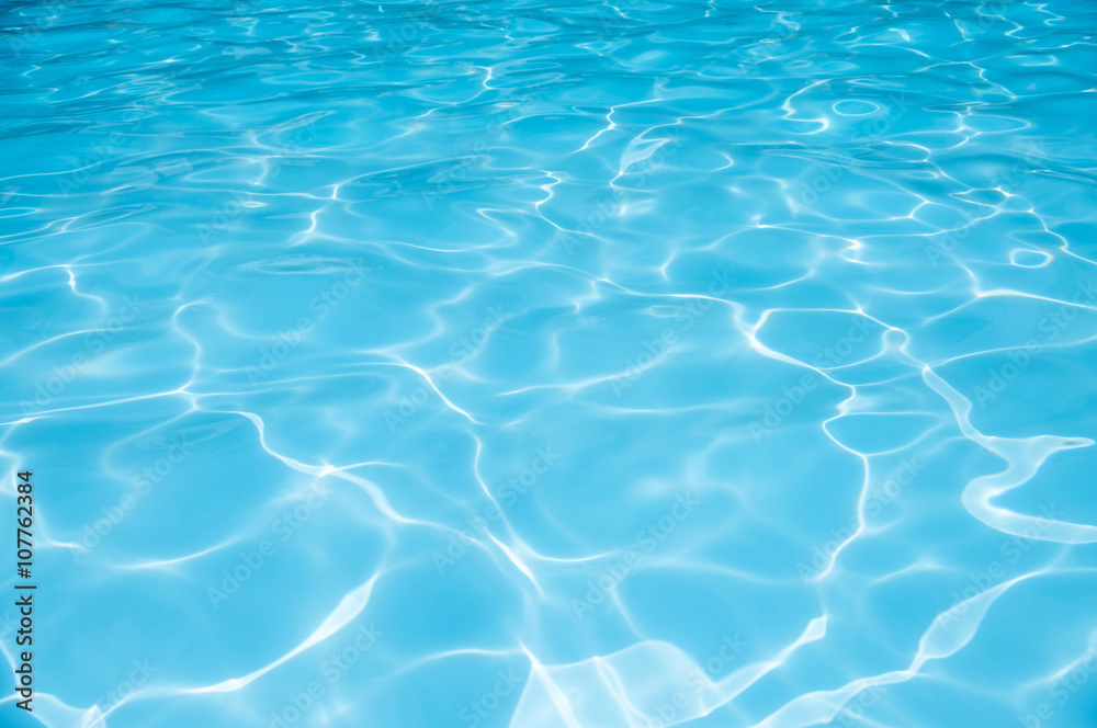 Fototapeta premium Ripple Water in swimming pool witn sun reflection