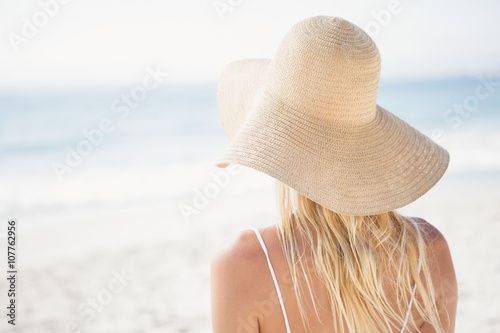 Blonde woman posing on the beach