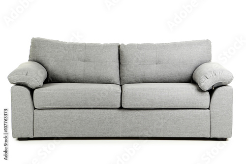 Grey sofa isolated on a white background photo