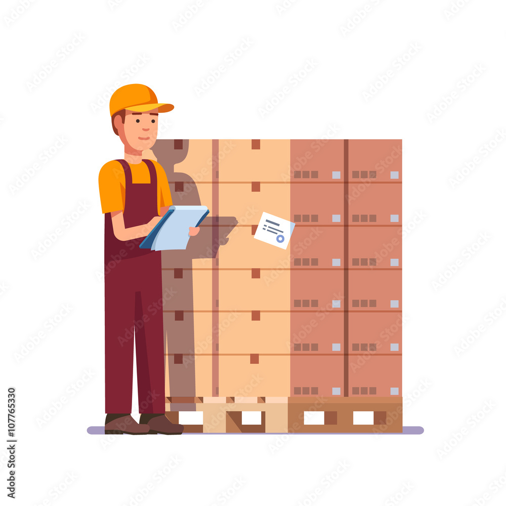 Warehouse worker checking goods on pallet Warehouse worker checking goods on pallet