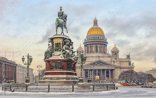A view of Isaac square with The Monument to Nicholas I and St.Isaac Cathedral at a snowy winter day © g_reg