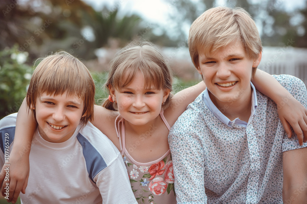 Fototapeta premium Group Of Children Playing In Park