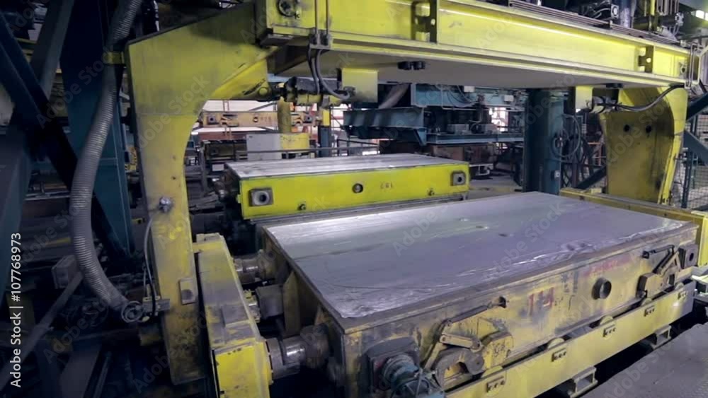 Robot making car parts at factory. Automative metal casting. HD. Robot making car parts at factory. Automative metal casting. HD.