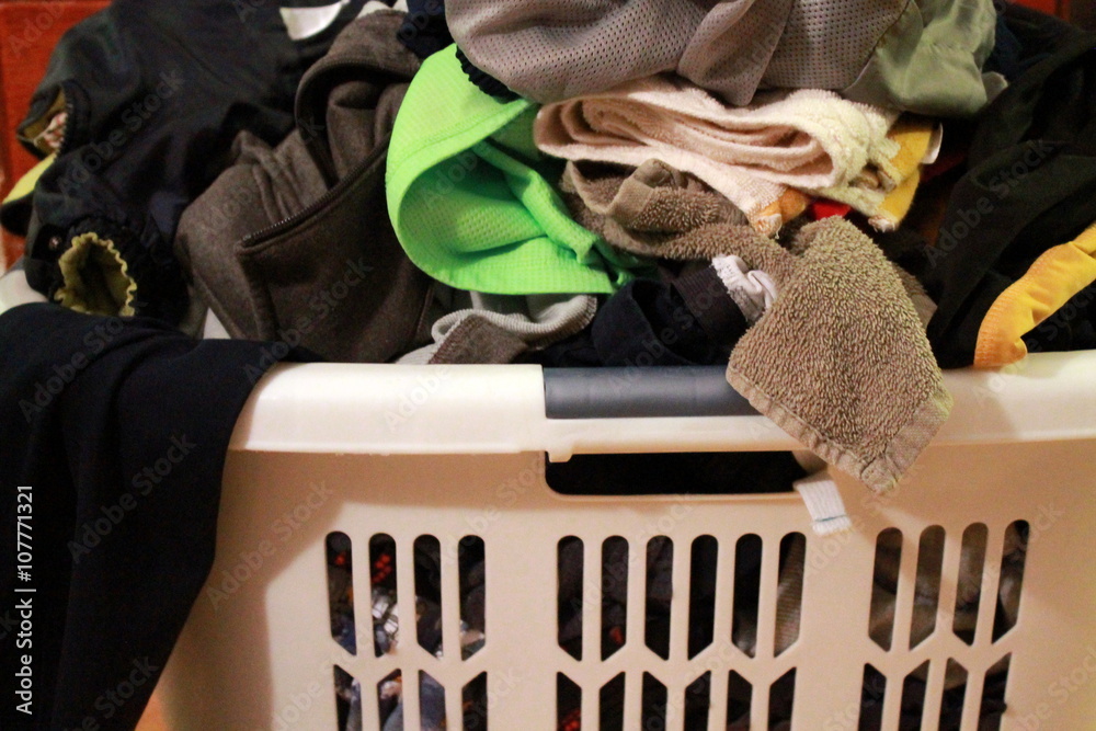 Laundry Basket Filled with Clothes