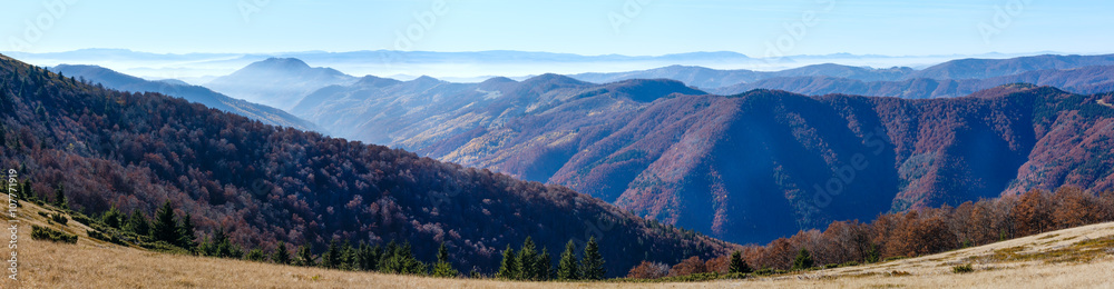 Fog in autumn Carpathian. Mountain panorama.