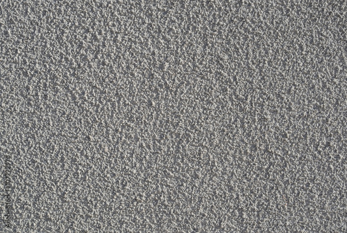 Gray stucco applied to an external building wall