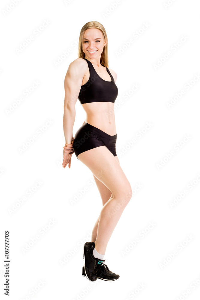 Young muscular woman posing