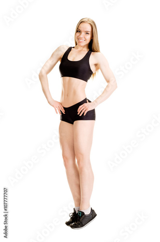 Young muscular woman posing