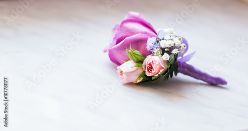 close-up of  Gentle groom's boutonniere 