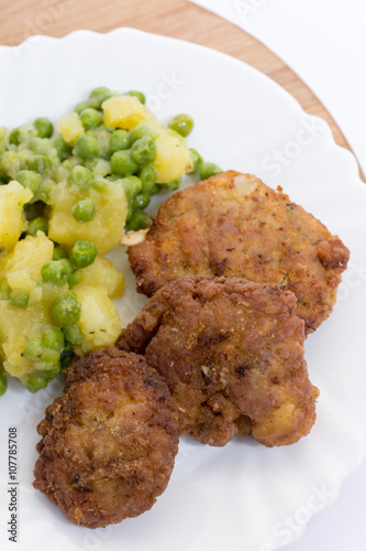 Homemade minced meat burgers from grandmothers kitchen and potat photo