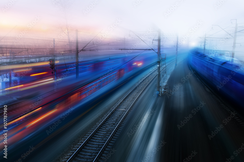 movement of trains in the ways of evening twilight fog Spring