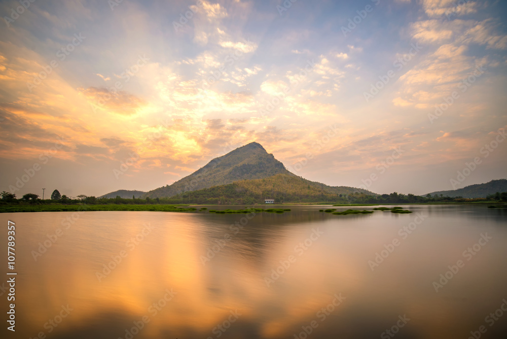 beautiful stunning sunrise landscape view of lake and mountain