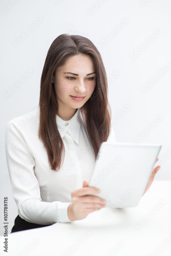 business woman working with the tablet in the office business woman working with the tablet in the office
