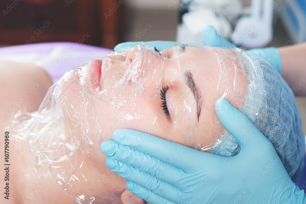 Woman in spa salon receive skin treatment. Woman in spa salon receive skin treatment.