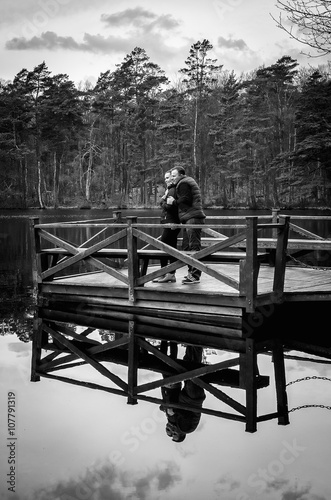 Couple on the bridge in monochrome