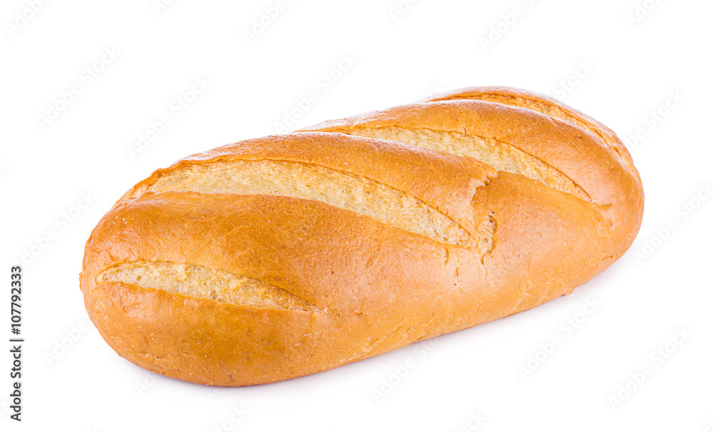 White wheaten long loaf on a white background. Bread close-up.