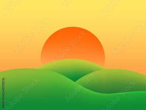 Summer country landscape with grassy green hills at sunset with orange and yellow sky sun