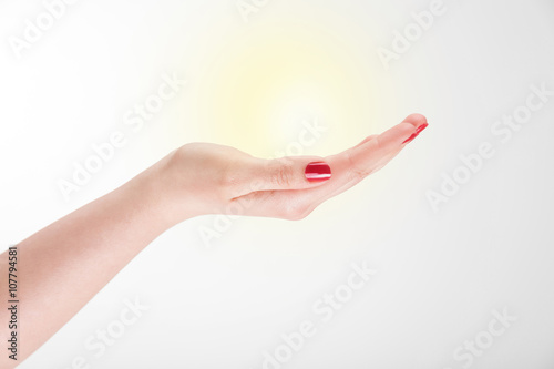 Hand carrying the light