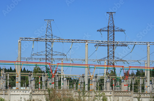 Electrical power high voltage substation encircled with barbed wire fence