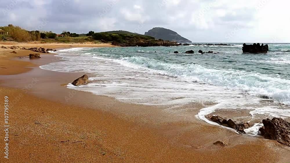 seascaoe with foamy swashing waves and cloudy sky seascaoe with foamy swashing waves and cloudy sky