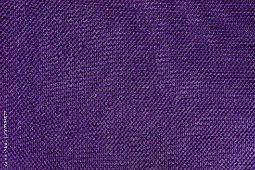 Purple and violet fishnet cloth material as a texture background Purple and violet fishnet cloth material as a texture background