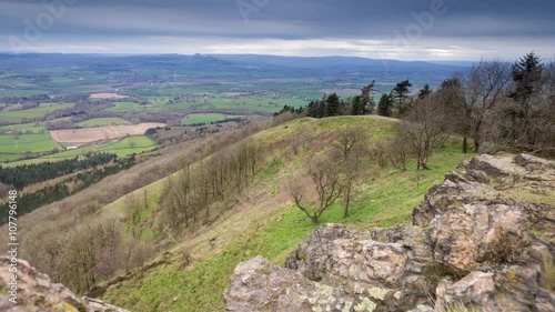 Top of Rocky Hill with View over British Countryside Land Time Lapse photo