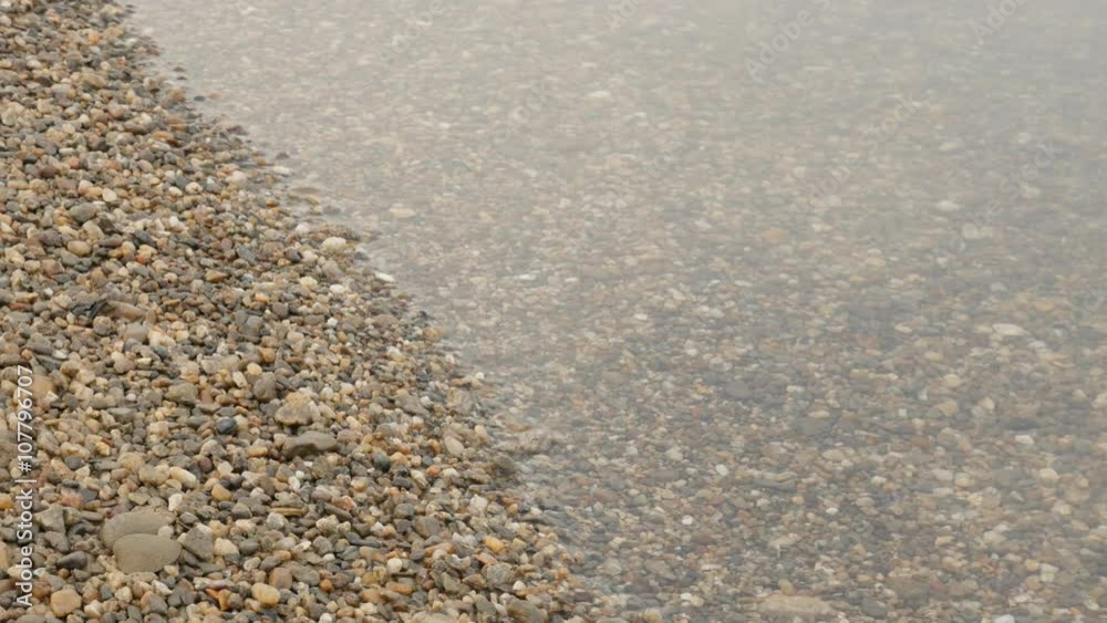 Shallow sandy riverside and water lazy moving close-up 4K 2160p 30fps UHD video - Relaxing movements of water near riverbank natural background 4K 3840X2160 UltraHD footage Shallow sandy riverside and water lazy moving close-up 4K 2160p 30fps UHD video - Relaxing movements of water near riverbank natural background 4K 3840X2160 UltraHD footage