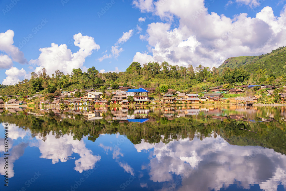 Fototapeta premium beautiful lake and sky view of village and mountain reflection