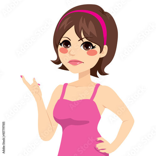 Beautiful young brunette woman with grumpy expression and pointing finger