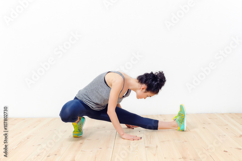 girl engaged in fitness at home