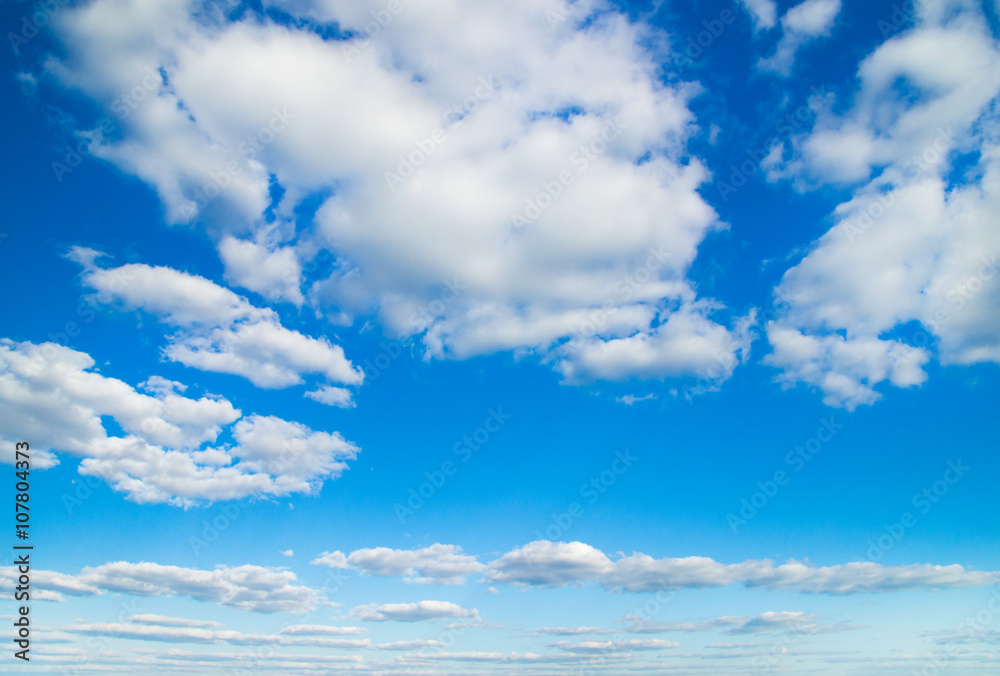 white fluffy clouds in the blue sky white fluffy clouds in the blue sky