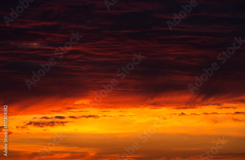 Scenic orange sunset sky background