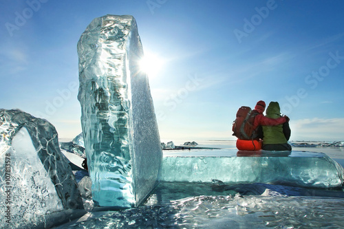Traveler among ice of lake Baikal