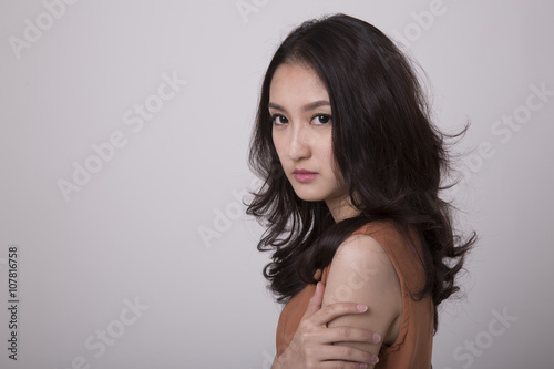  isolated shot of an angry beautiful asian woman