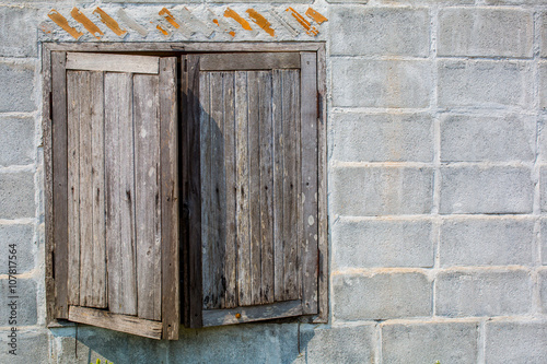 Old wood window on concrete wall