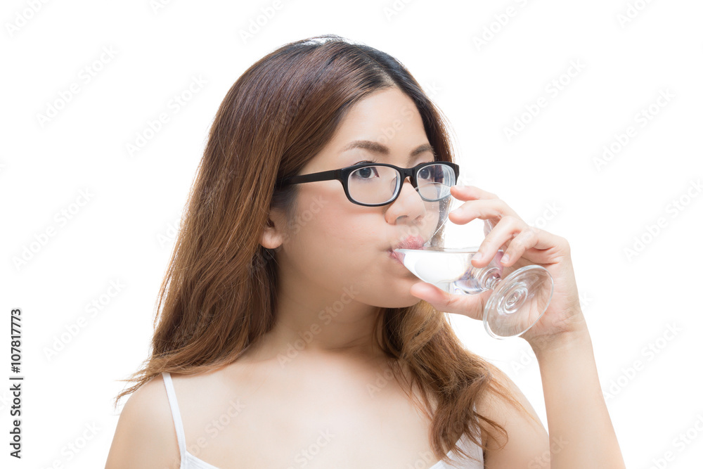 healthy woman drinking water on white background