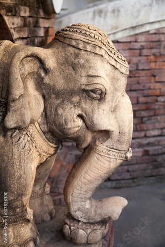 A stone elephant sculpture close-up