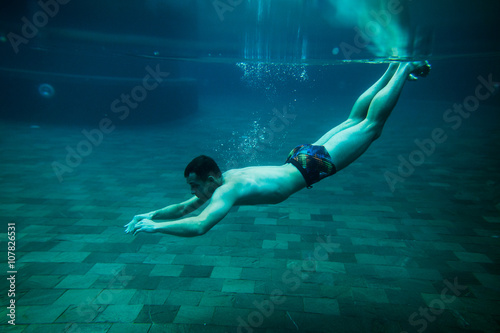 man swim underwater pool © shevtsovy