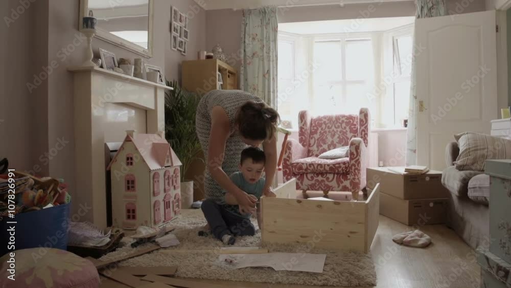 Mother And Son Assembling Flat Pack Draws. DIY Mother And Son Assembling Flat Pack Draws. DIY