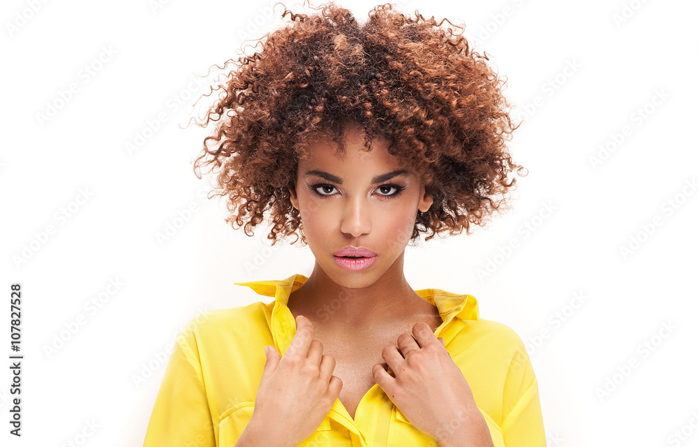 Fototapeta premium Portrait of young girl with afro.