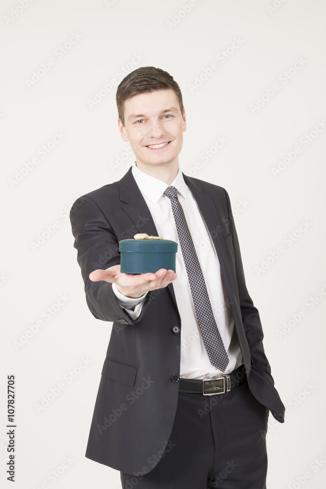 Handsome young man with gift box Handsome young man with gift box